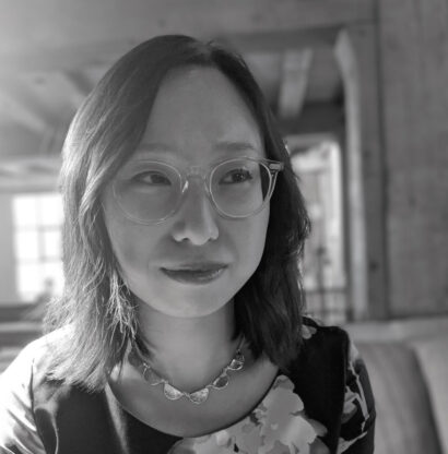 Photograph of writer Diana Xin with glasses
